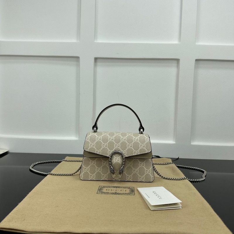 G*u*i top handle bags